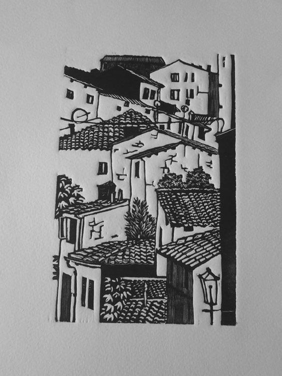 a black and white drawing of rooftops