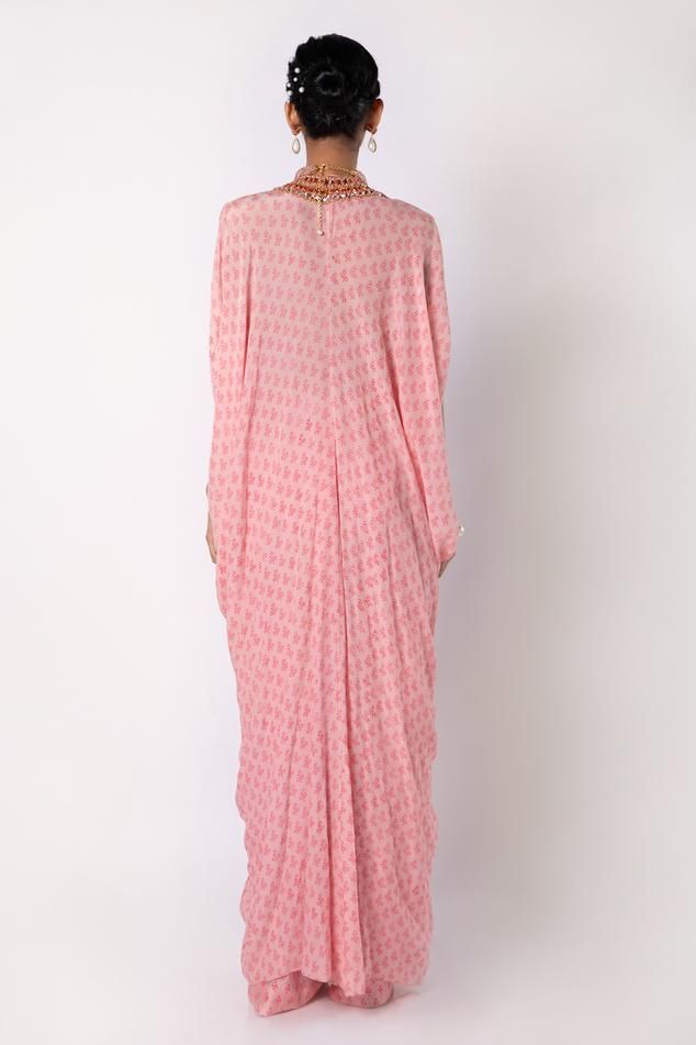 Roseate pink all over geometric print kaftan, highlighted with hand embroidered placket. Paired with straight pant.
Components: 2
Pattern: Print, Hand Embroidery
Type Of Work: Geometric, Stones, Crystals, Cutdana
Neckline: V Neck
Sleeve Type: Split Sleeves
Fabric: Natural Crepe: Kaftan,  Cotton Silk: Pant
Color: Pink
Other Details: 


Model height: 5 ft. 9 inches, wearing size S

Occasion: Sangeet - Aza Fashions Silk Pant, Pant For Women, Crystal Stone, Straight Pants, Cotton Silk, Aza Fashion, Model Height, Sleeve Type, Geometric Print