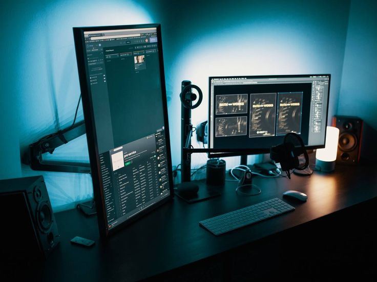 a desktop computer sitting on top of a wooden desk