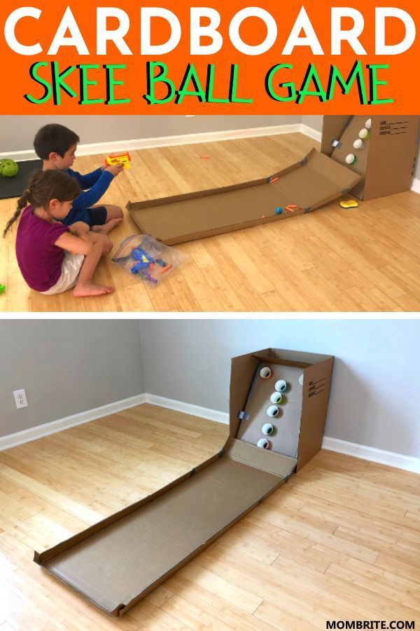 kids playing with cardboard board and ball game