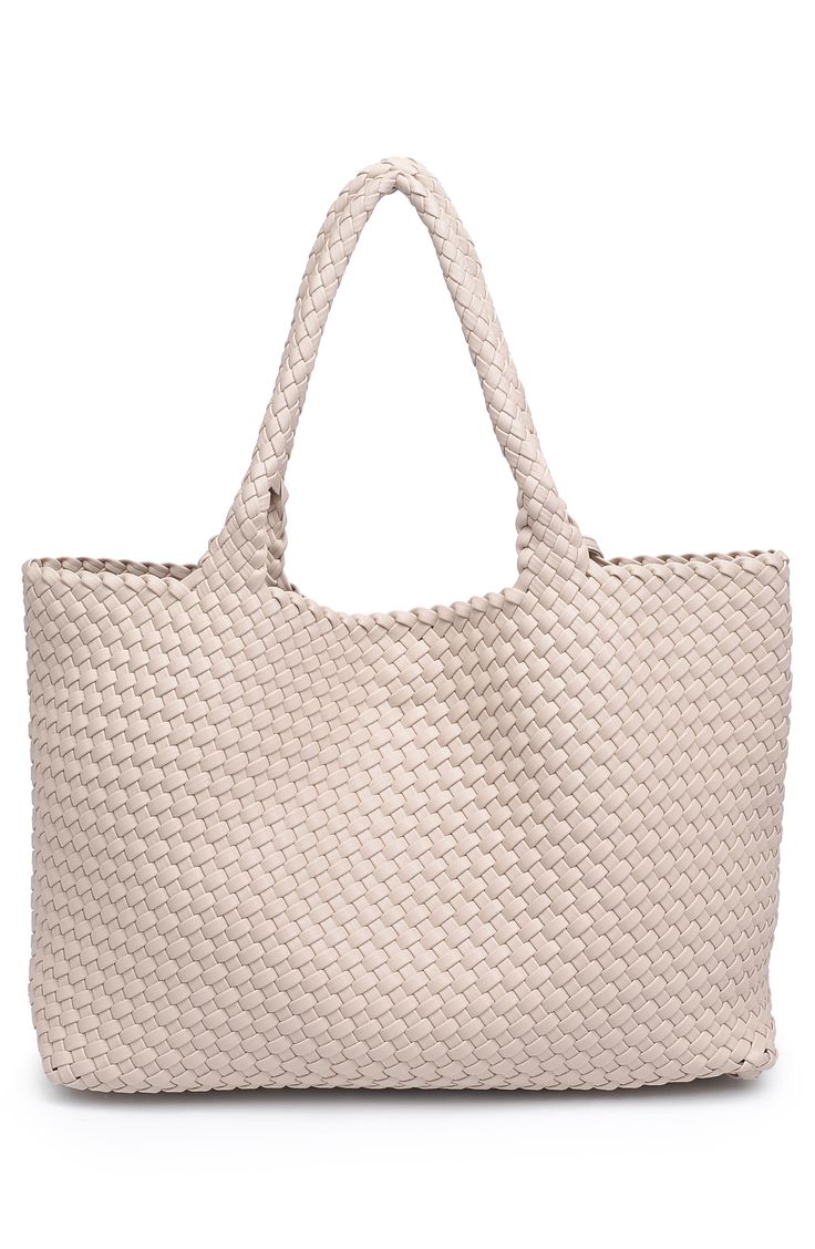 A woven construction gives this spacious and unlined tote bag it's relaxed and slouchy silhouette to compliment your on-the-go lifestyle. Synthetic Two top handles Polyurethane
 Imported Beige Bucket Bag With Rolled Handles For Travel, Chic Large Capacity Cream Beach Bag, Travel Shoulder Bag In Beige With Rolled Handles, Beige Hobo Bag With Rolled Handles For Shopping, Travel Beige Shoulder Bag With Rolled Handles, Neutral Bags With Rolled Double Handles, Beige Shoulder Bag With Rolled Handles For Travel, Neutral Double Handle Bag With Rolled Handles, Cream Bags With Rolled Handles For Everyday