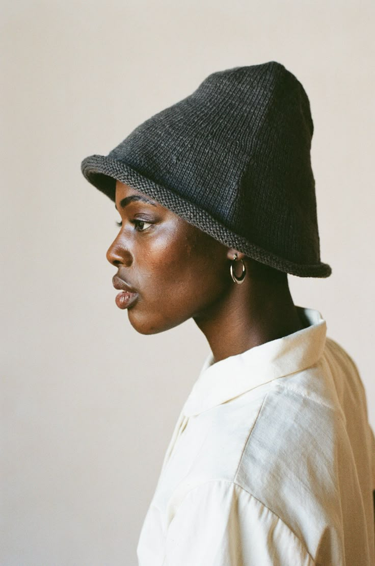 A knit bucket-style hat with seamless construction and a rolled edge. Flexible, moldable, and packable for every adventure to come. Naturally dyed using the earth, charcoal is a smoky gray. Knit Bucket Hat, Cool Hat, Hair Wrap Scarf, Drawing People Faces, Types Of Hats, Photography Inspiration Portrait, Matching Sweaters, Dress Hats, Natural Dye