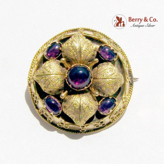 Antique Ornate Brooch Amethyst Cabochons, Foliate Decorations, Tiny Applied Wire Patterns & Rim, Closed Back 14K Yellow Gold c. 1870.  This spectacular brooch is 1" in diameter and weighs 5.4 grams.  [nb1095] Ceremonial Gold Cabochon Brooches, Purple Victorian Wedding Brooches, Wire Patterns, Antique Yellow Gold Brooches With Gemstone, Luxury Antique Cabochon Brooches, Antique Gold Brooch With Gemstone, Victorian Yellow Gold Brooches With Gemstone, Ornate Gold Cabochon Brooches, Victorian Multi-stone Wedding Brooches