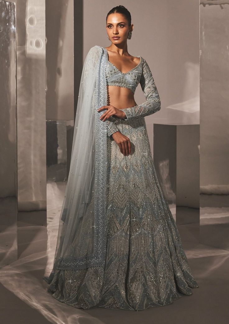 Ritika Mirchandani-Miray Iceblue Silver Lehenga Set-INDIASPOPUP.COM Luxury Embroidered Silver Choli, Luxury Silver Floor-length Lehenga, Luxury Silver Semi-stitched Lehenga, Luxury Silver Lehenga For Formal Occasions, Luxury Silver Blouse With Resham Embroidery, Abstract Lehenga, Blue Reception Lehenga, Ice Blue Lehenga, Silver Lehenga