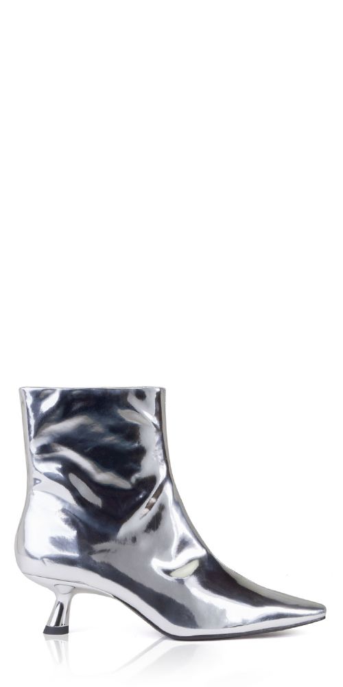 Upgrade your wardrobe with the sleek and stylish Simon Miller Kuki Ankle Boot. Made from metallic chrome silver leather, it features a classic pointed toe and sculptural kitten heel for a timeless yet modern look. Elevate any outfit with this must-have addition. Details: Color: Chrome 100% leather Heel height: 5cm/2in Boot shaft: 16cm Vendor Code: F171-9137 Zip closure Fits true to size; European sizing Modern Silver Low Heel Heels, Modern Metallic Pointed Toe Heels, Elegant Metallic Boots With Pointed Toe, Modern Metallic Heels In Metallic Leather, Elegant Silver Snip Toe Boots, Modern Metallic Leather Heels, Fall Metallic Pointed Toe Heeled Boots, Fall Metallic Heeled Boots With Pointed Toe, Glamorous Metallic Pointed Toe Boots