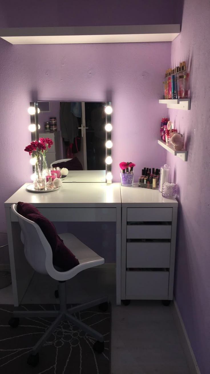 a white desk topped with a mirror and lights