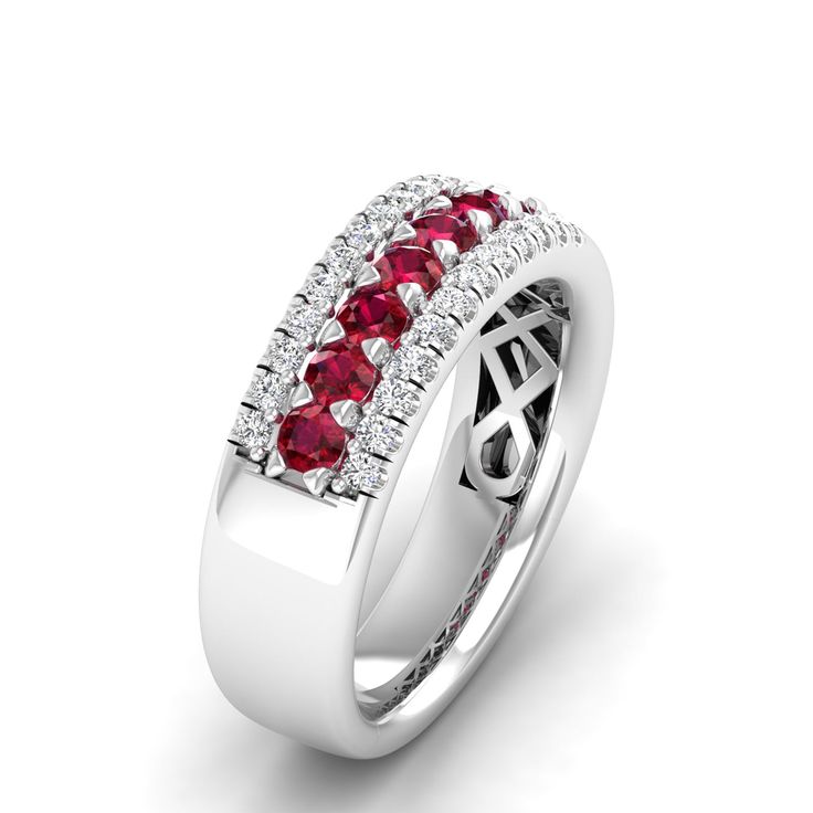 This stunning wedding ring features vibrant red diamonds set in elegant gold, creating a timeless and luxurious piece of jewelry that symbolizes love and commitment. The striking contrast between the deep red diamonds and the bright gold makes this ring a unique and eye-catching choice for any bride or groom. Metal: 14K Gold Setting Type: Prong Rhodium Finish: Yes, on White Gold Gemstone Details: Gemstone: Ruby Shape: Round Average Dimensions: 2.50 MM Quantity: 07 Average Cut: Very Good Average Luxury Ruby Ring With Half Eternity Round Cut, Luxury Ruby Half Eternity Ring, Luxury Red Ring With Prong Setting, Red Ruby Ring With Halo Setting For Formal Occasions, Luxury Red Ruby Ring For Anniversary, Luxury Ruby Half Eternity Ring For Anniversary, Luxury Red Lab-created Ruby Ring, Luxury Formal Ruby Ring With Half Eternity, Luxury Formal Ruby Half Eternity Ring