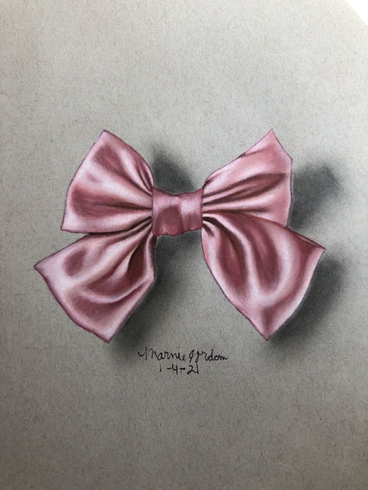 a drawing of a pink bow on grey paper