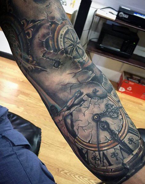 a man with a clock tattoo on his arm