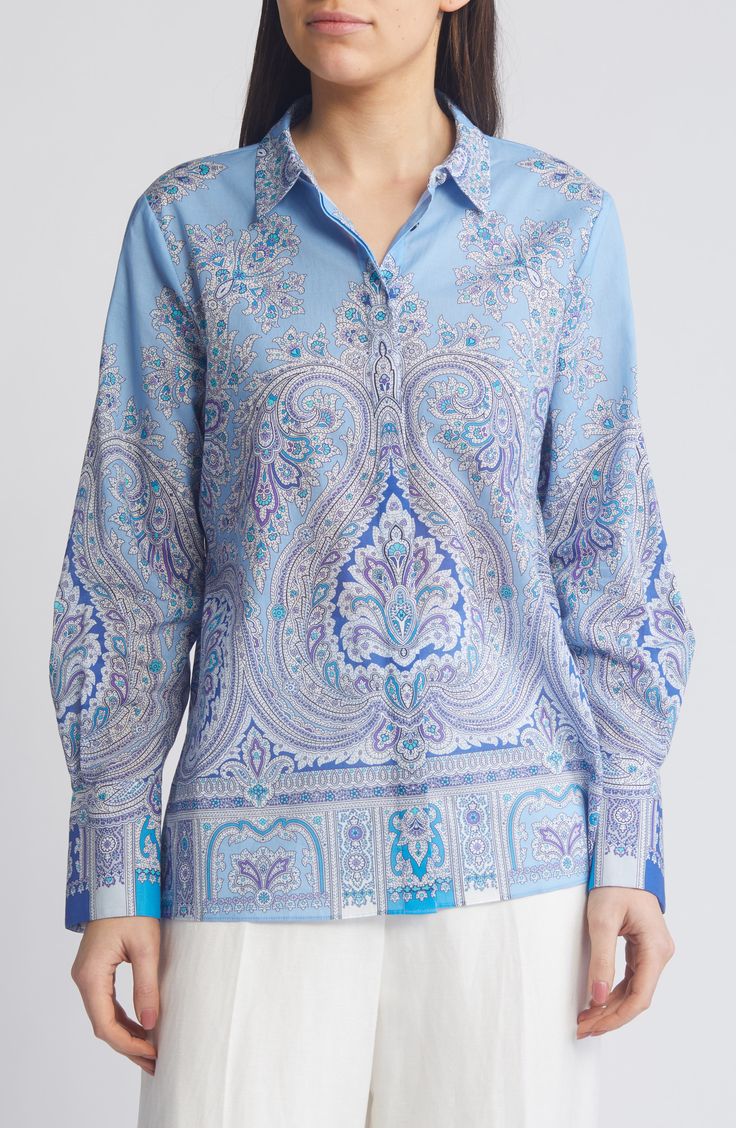 A serene paisley print swirls across a crisp cotton popover shirt eased by an inverted back pleat for a relaxed fit. 27" length Hidden-button half placket Spread collar Long sleeves with button cuffs 100% cotton Dry clean Imported Formal Paisley Print Tops For Spring, Elegant Long Sleeve Paisley Print Tops, Elegant Printed Blouse With Spread Collar, Classic Blue Paisley Print Tops, Elegant Floral Print Blouse With Relaxed Fit, Elegant Printed Relaxed Fit Blouse, Elegant Printed Blue Blouse, Elegant Blue Printed Blouse, Classic Patterned Top With Paisley Print