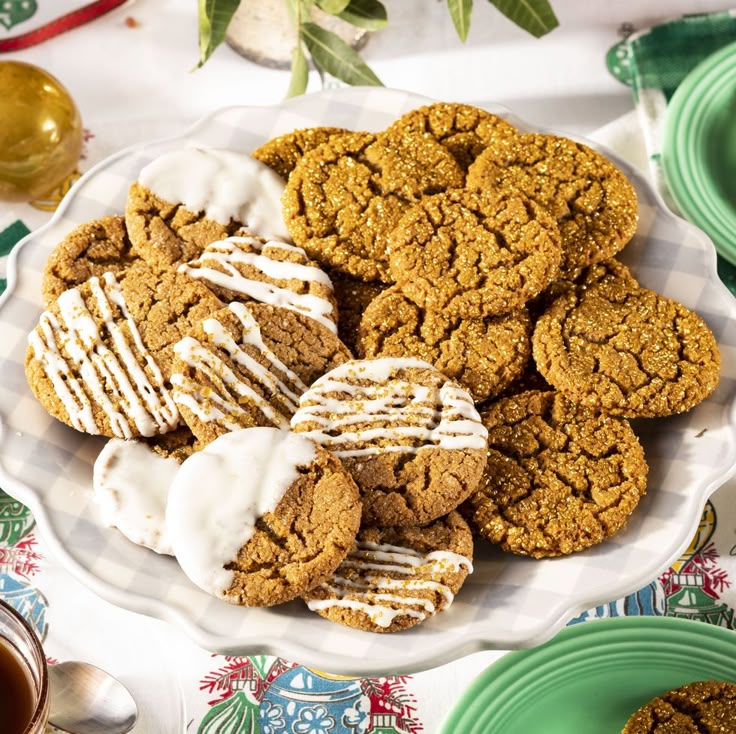 a white plate topped with cookies covered in frosting