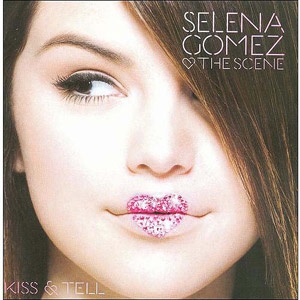 a woman with pink lipstick on her lips and the words selena gomez on