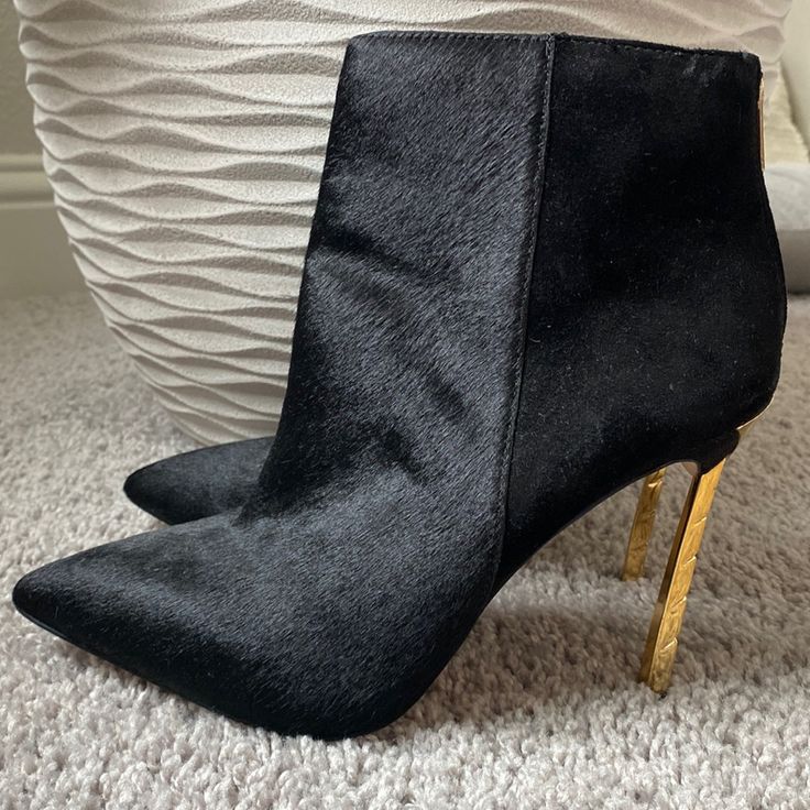 Black Calf Hair/Suede High Heel Bootie With Gold Metal Heel. New And Unworn. Size 9. Heel Is About 4 1/2 Inches Chic Calf Hair Heels With Pointed Toe, Chic Calf Hair Pointed Toe Heels, Formal Suede Booties With Pointed Toe, Black Calf Hair Boots For Fall, Chic High Heel Calf Hair Shoes, Chic High Heel Calf Hair Heels, Chic Calf Hair High Heels, Chic Suede Booties For Formal Occasions, Elegant Suede Evening Booties