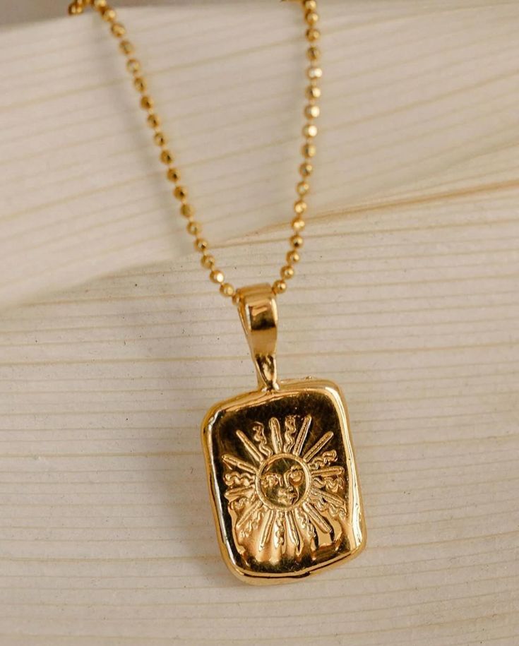 Here comes the Sun 🌞 Our sun pendant tarot card necklace is inspired by the positive sun tarot card, which signifies optimism, fulfillment, abundance & good fortune. This gold tarot card necklace is a reminder of the good things in life. We took our best-selling Sun Tarot Ring and turned it into a beautiful tarot card pendant you can wear close to your heart every day to remind you of the transformative powers of the sun. Let this tarot necklace bring a bit of everyday magic to your li... Gold Jewelry Men, Gold Pendants For Men, Tarot Necklace, Sun Tarot Card, Tarot Card Necklace, Necklace Man, Gold Reserve, Pendants For Men, Abstract People