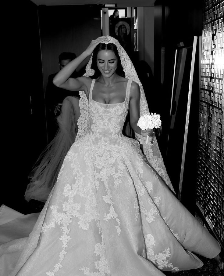 black and white photograph of a bride in her wedding dress