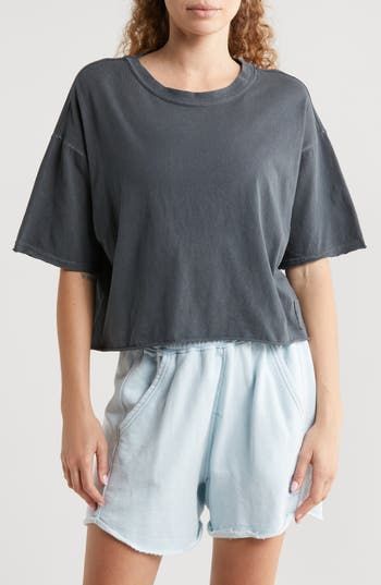 Whether you're warming up or cooling down on the pickleball court, you'll love rocking the boxy, slightly cropped fit of this all-cotton T-shirt. 20" length" (size Medium) Crewneck Elbow-length sleeves 100% cotton Machine wash, tumble dry By Free People; imported Black Relaxed Fit Cropped T-shirt Athleisure, Black Boxy Cropped Top, Sporty Crew Neck Relaxed Fit Crop Top, Black Loose Fit Cropped Cotton T-shirt, Black Boxy Cropped Cotton T-shirt, Black Cropped Top With Relaxed Fit, Black Cropped Relaxed Fit Top, Relaxed Fit Washed Black Graphic Tee, Relaxed Fit Washed Black Short Sleeve Tops