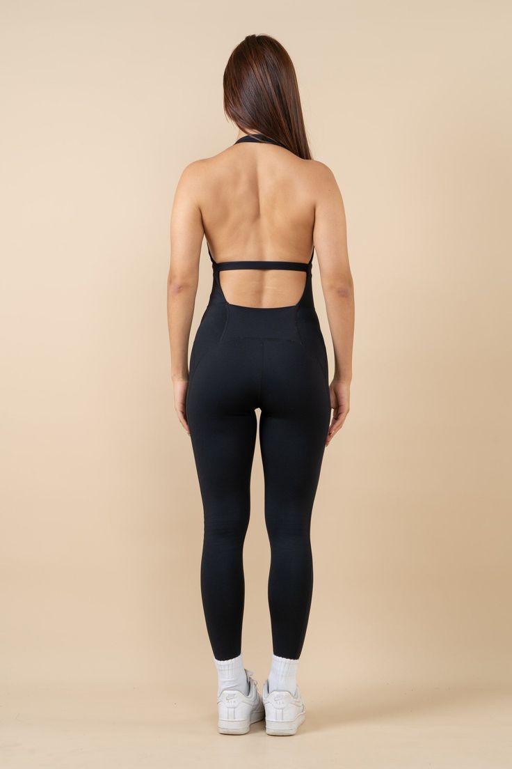 Description: The polyester and spandex material of the jumpsuit ensures providing elasticity, breathability, softness, and comfortability. The material components help absorb the sweat quickly and provide a comfortable experience when doing exercise. Also, its unique back cuts bring great elasticity, so you can wear it all day in a comfortable feeling. Black Athleisure Jumpsuit With Built-in Bra, Black Unitard With Built-in Bra For Workout, High Stretch Sports Unitard With Built-in Bra, Breathable Fitted Bodysuit For Gym, High Stretch Moisture-wicking Unitard For Yoga, Black Stretch Jumpsuits And Rompers In Elastane, Athleisure Bodysuit With Built-in Bra, High Stretch Moisture-wicking Bodysuit For Sports, Stretch Functional Bodysuit For Sports