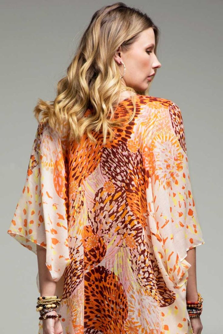 Airy vibrant dandelion print kimono with side slits, beautiful to pair with white tank and white jeans or solid tank dress! APPROX. L 73" W 36" 100% Polyester Multicolor Print Kimono For Spring Beach Cover-up, Spring Flowy Tops With Vibrant Print, Summer Kimono With Abstract Print, Summer Blouse With Graphic Print For Spring, Flowy Summer Blouse With Kimono Sleeves, Spring Bohemian Blouse With Graphic Print, Flowy Blouse With Kimono Sleeves For Summer, Graphic Print Blouse For Summer, Flowy Spring Tops With Vibrant Print