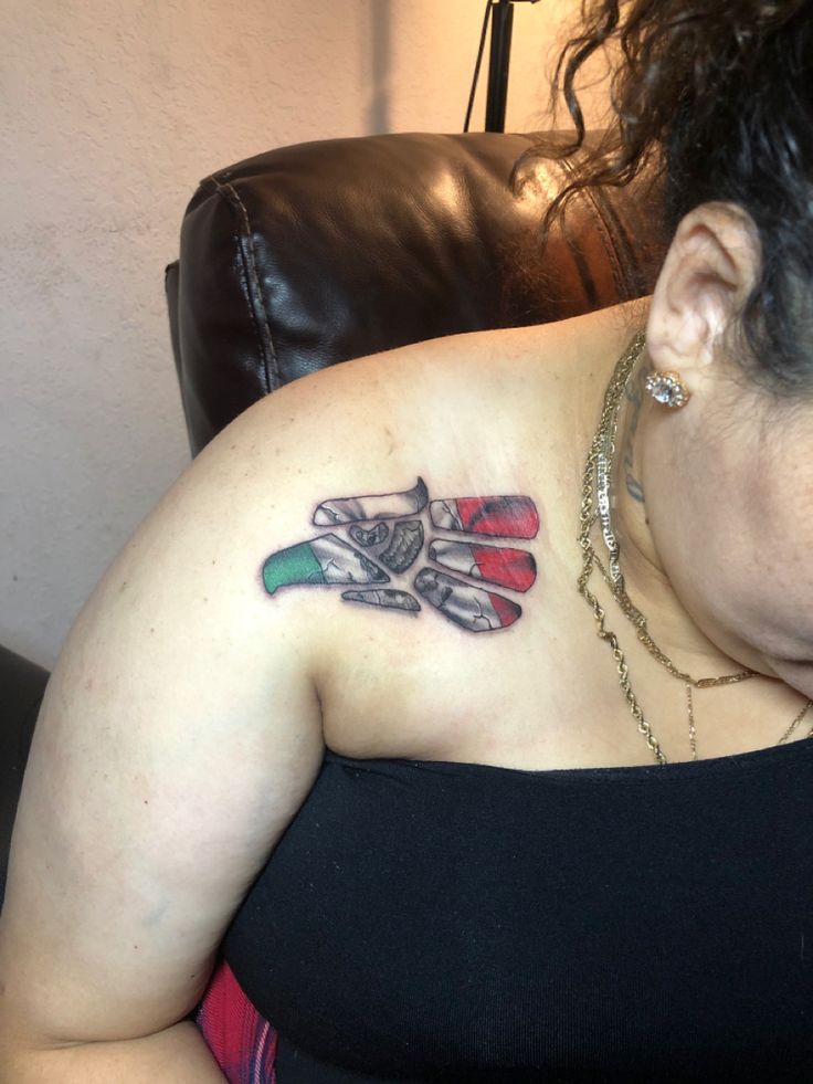 a woman with a tattoo on her chest