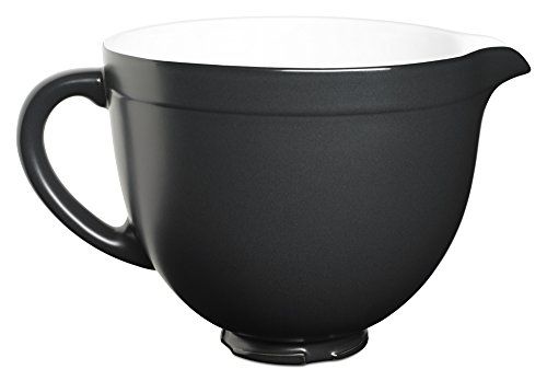 a black and white coffee cup on a white background