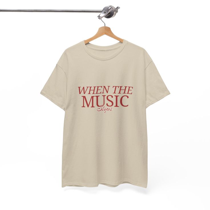 Introducing the ultimate fan must-have: the JXDN "When The Music Stops" Tee! This casual yet trendy shirt is the perfect way to showcase your love for JXDN's latest album. Made from ultra-soft, breathable cotton, it offers unbeatable comfort for everyday wear. The front features a minimalist design with the album's title, while the back is where the magic happens. Adorned with the complete track list and the duration of each song, this tee is a nod to true fans who know every beat and lyric by heart. Its cute and stylish look makes it a versatile addition to any wardrobe, whether you're heading to a concert, hanging out with friends, or just lounging at home. This JXDN "When The Music Stops" Tee isn't just apparel; it's a statement piece that celebrates the music that moves you. Perfect fo Music-themed Cotton Shirt For Streetwear, Music-themed Cotton Shirt Fan Merchandise, Music-themed Cotton Fan Merchandise Shirt, Music-themed Streetwear Shirt For Summer, Music-themed Relaxed Fit Cotton Shirt, Music-themed Cotton T-shirt With Relaxed Fit, Where The Magic Happens, Latest Albums, Trendy Shirts