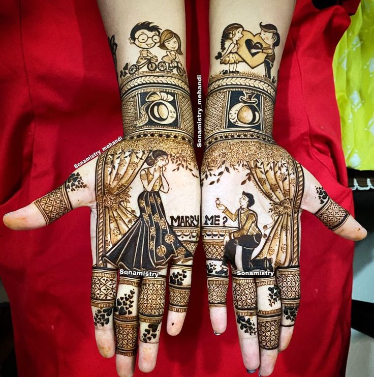 two hands with henna designs on them