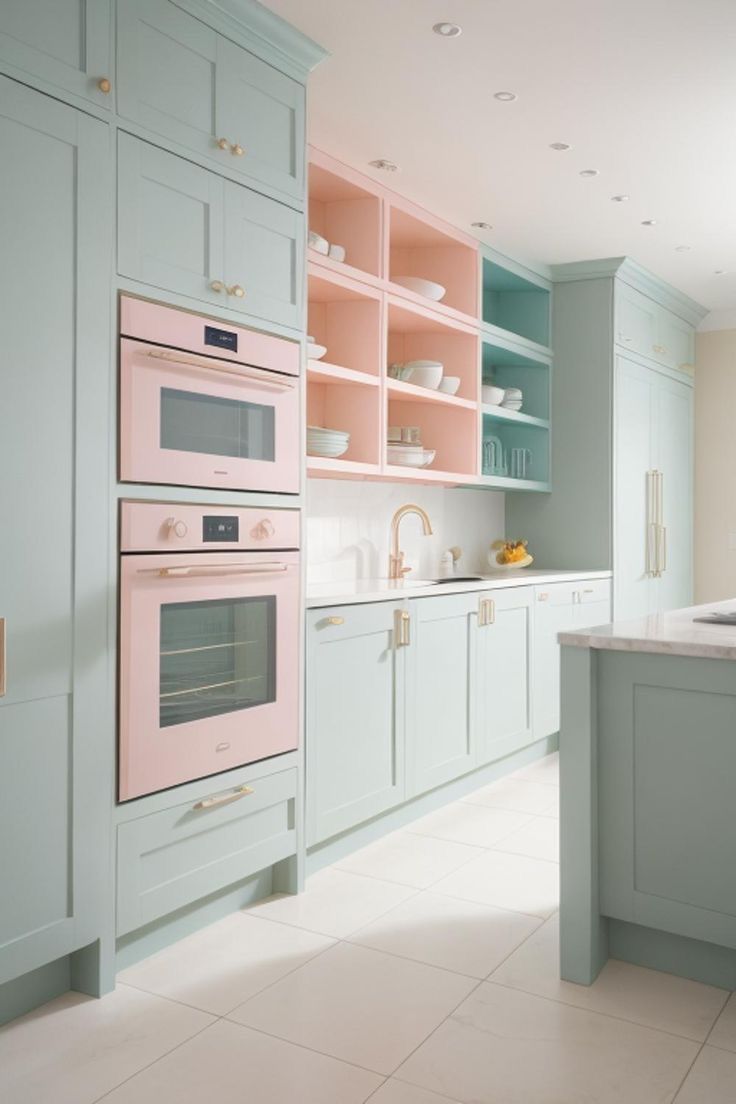 a kitchen with pastel blue cabinets and pink ovens in the center, along with white counter tops