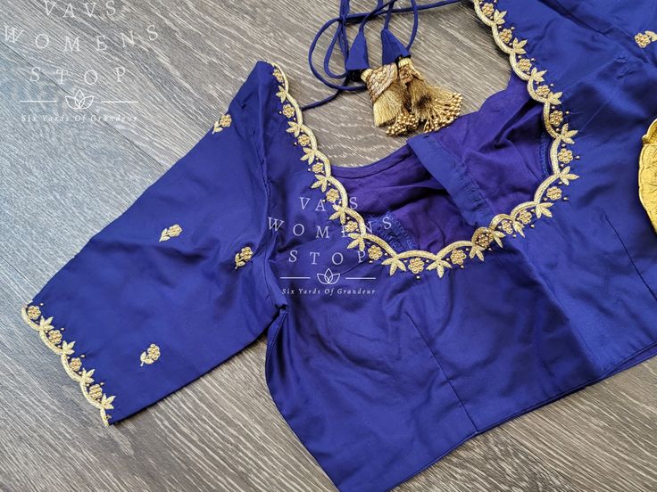 Introducing the Handwork Maggam NavyBlue Blouse Elevate your traditional wardrobe with our Handwork Maggam NavyBlue Blouse. This stunning piece is handcrafted with intricate Maggam work, adding a touch of elegance and sophistication to your outfit. The deep navy blue color is perfect for any occasion, making it a versatile addition to your collection. Our blouses are stitched to perfection, ensuring a comfortable and flattering fit. With a blouse size of 36 and inner margins expandable up to 42, Elegant Blue Tops With Traditional Drape, Elegant Blue Blouse With Zari Work, Elegant Blue Blouse With Resham Embroidery, Traditional Embroidered Tops For Workwear, Formal Blue Embroidered Blouse, Royal Blue Elegant Festive Blouse Piece, Blue Blouse With Intricate Embroidery In Traditional Drape, Traditional Blouse With Intricate Embroidery For Formal Occasions, Traditional Formal Blouse With Intricate Embroidery