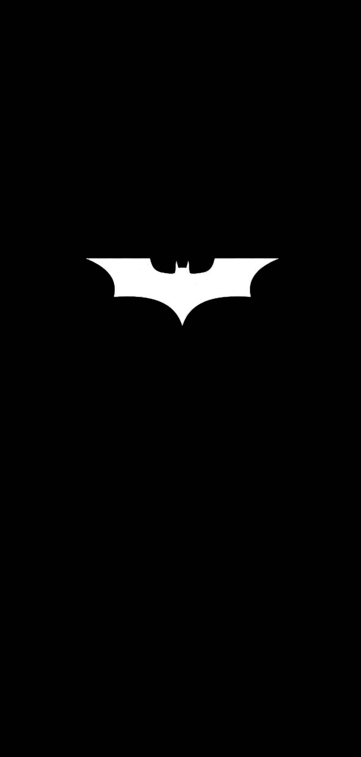 the dark knight rises logo in silhouette on a black background, with only one bat visible