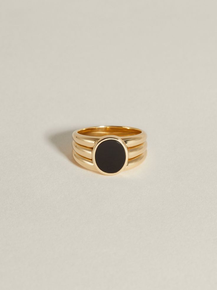 We couldn't pick between whether we wanted to wear ethereal, iridescent Mother of Pearl, or inky, pigmented Black Onyx... so we chose both. This Stacked Signet introduces a timely reinterpretation to the JH signet oeuvre — a signature oval signet shape with an architecturally-inspired, wide band. Our new sophisticated counterpart to this classic introduces black onyx inlay. Solid 14k gold or sterling silver signet with a thick, triple ridged band. Face measures 10 x 8mm, with the stone face meas J Hannah, Onyx Signet Ring, Unique Mens Rings, Heirlooms Jewelry, Stone Inlay, Fine Jewelry Collection, Wide Bands, Signet Ring, Gold Bands