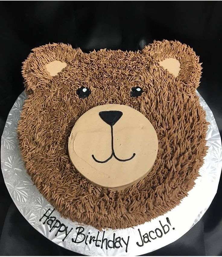 a birthday cake that is shaped like a bear