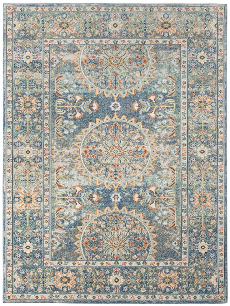 a blue and beige rug with an ornate design