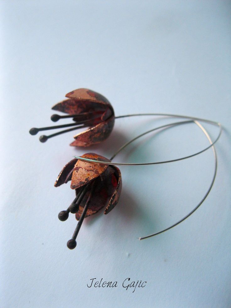 "Handmade earrings made of copper, inspiration from the flower. The width of the flower earrings is 2-2.5 cm, total length of the earring is 5.5 cm. Ear hook is made of silver wire. Every item is gift wrapped free of charge. A personalized note can be included with any item, please include your desired message during your purchase. If you have any questions, I would be glad to answer :) Please order items early to assure holiday delivery and thank you for taking time for visiting my shop Dear cu Ear Hangers, Artisan Earrings, Botanical Jewelry, Handmade Copper, Ear Hook, Copper Earrings, Delicate Flower, Brass Earrings, Leaf Earrings