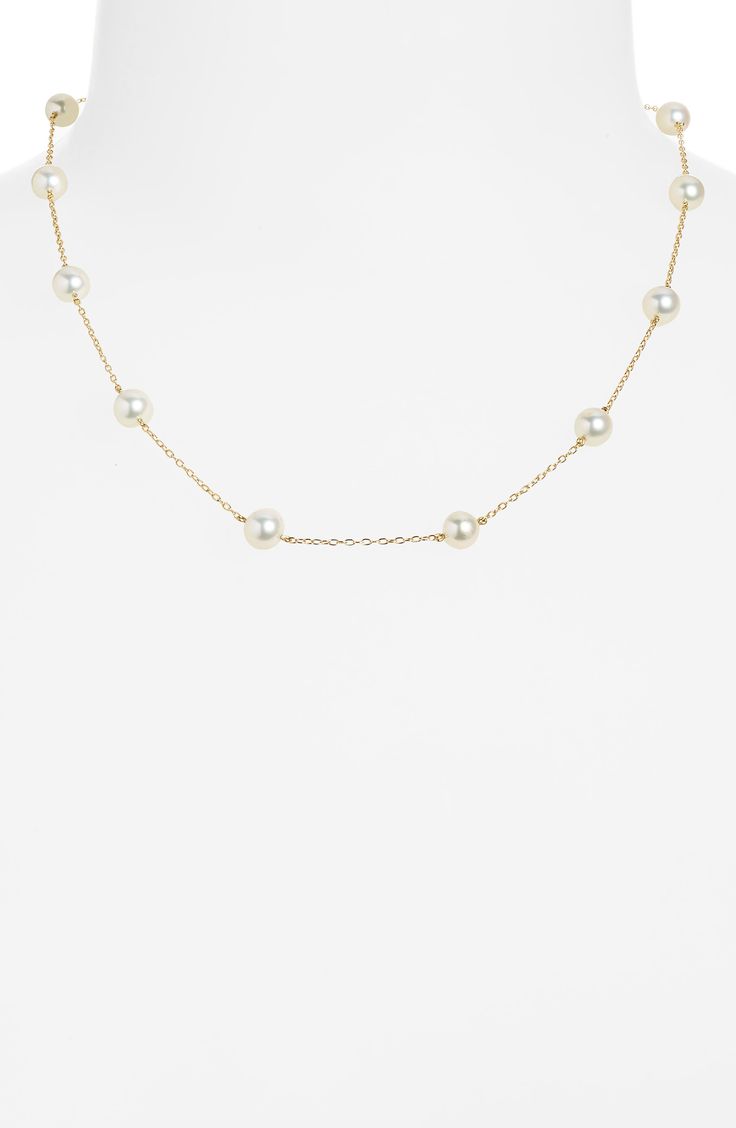 In this quietly elegant necklace, lustrous pearls play in a pretty way against delicate links dipped in 14-karat gold. 14k gold plate/genuine pearl Made in Japan Asian Owned/Founded Formal 14k Gold Pearl Necklace With Delicate Chain, Elegant 14k Gold Station Necklace For Formal Occasions, Elegant 14k Gold Station Necklace For Formal Events, Classic Pearl Chain Necklace For Formal Occasions, Classic Pearl Chain Necklace For Formal Events, Classic Single Strand Pearl Necklace In 14k Gold, 14k Gold Pearl Chain Necklace Fine Jewelry, Formal Akoya Pearl Necklace With Delicate Chain, Classic Pearl Necklace With Delicate Chain For Formal Occasions