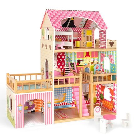 a wooden doll house with furniture and accessories