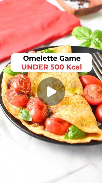 omelette game under 50 kgal with tomatoes and lettuce on the side