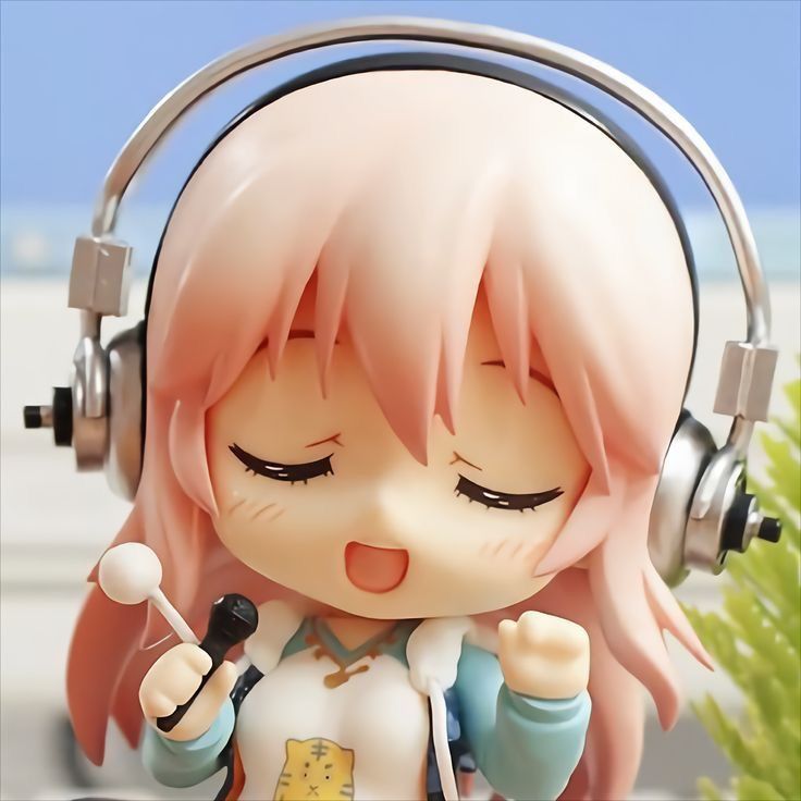 a close up of a toy with headphones on