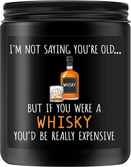 a black glass jar with an image of a whiskey bottle and the words i'm not saying you're old, but if you were a whisky you'd be really expensive