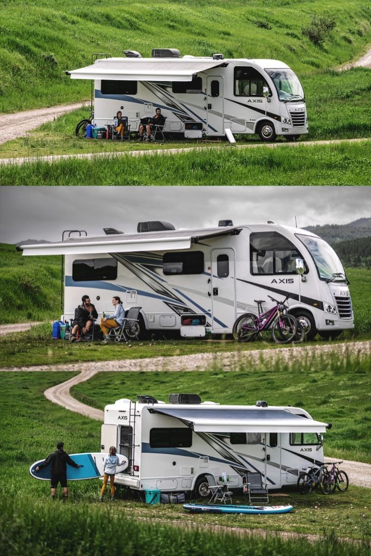 two rvs parked on the side of a dirt road next to a grassy field