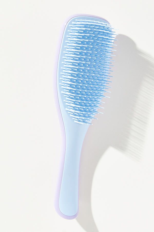 The Ultimate Detangler by Tangle Teezer effortlessly slips through your hair (and thanks to its handle, not out of your wet hands). The patented two-tiered teeth technology is gentle on vulnerable, shower-fresh hair, meaning less breakage, more of that running-your-fingers-through-your-hair feeling. | The Ultimate Detangler Brush by Tangle Teezer in Blue, Women's, Plastic at Anthropologie Blue Tangle Teezer, Preppy Hair Accessories, Cute Hairbrush, Cute Hair Brush, Tangle Teaser, Tangle Teezer Brush, Blue Wishlist, Christian Core, Detangler Brush