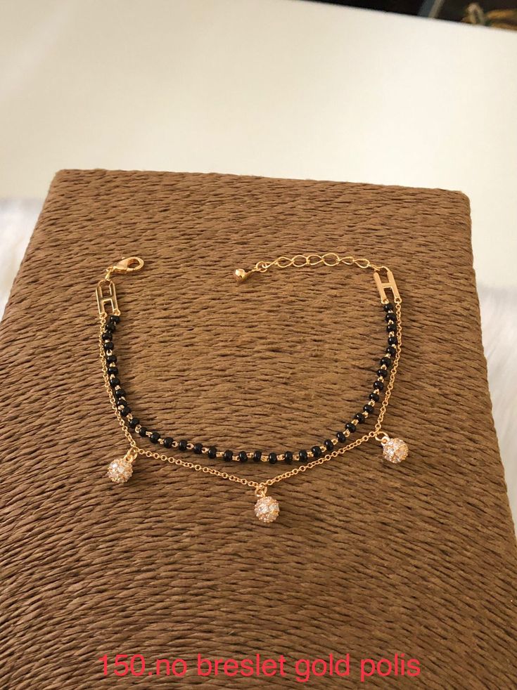 Black Bead Bracelet Gold, Mangal Sutra Bracelet Design, Gold Bracelet With Black Beads, Mangalsutra Bracelet Designs Gold, Hand Mangalsutra Bracelet In Gold, Mangalsutra Bracelet Design, Black Beads Bracelet Gold, Hand Mangalsutra Bracelet, Hand Mangalsutra