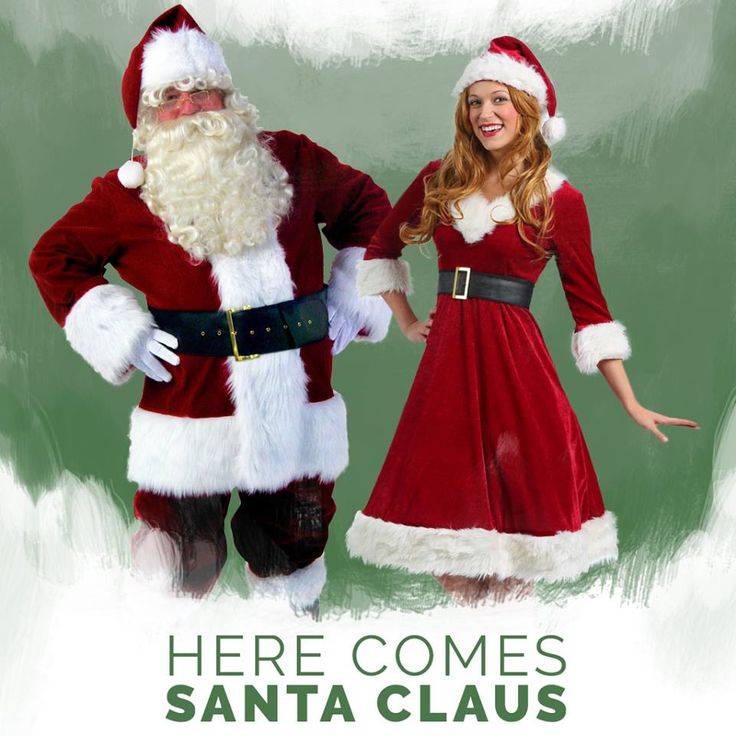 there is a man and woman dressed as santa claus