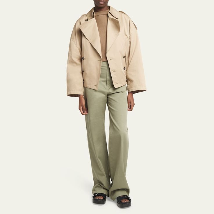 Loewe cropped tench jacket features a ribbed hemline  Notched collar  Button front closure  Long sleeves Side slip pockets  Hip length  Loose fit�  Cotton/nylon/polyamide/elastane Made in Italy Spring Structured Double-breasted Outerwear, Modern Spring Outerwear With Double-breasted Button Fastening, Modern Spring Outerwear With Double-breasted Button, Spring Double-breasted Outerwear With Flap Pockets, Spring Structured Outerwear With Double Button Closure, Structured Spring Outerwear With Double Button Closure, Winter Cropped Outerwear With Button Cuffs, Modern Double-breasted Outerwear For Spring, Cropped Jacket With Button Cuffs For Fall