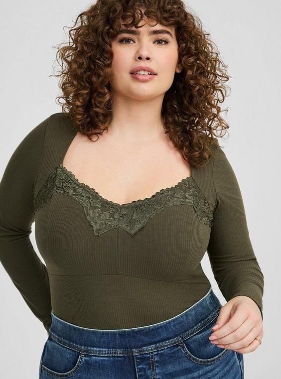 FIT Measures 30” from shoulder (size 2). MATERIALS + CARE Super Soft rib knit fabric. 56% polyester, 34% rayon, 10% spandex. Machine wash cold. Line dry. . Imported. DETAILS Sweetheart neckline. Long sleeves. Lace trim detail. The best plus size women's super soft ribbed sweetheart top long sleeve tops in deep depths made of supersoftrib. Torrid is your destination for cozy fall and winter clothes to keep you warm and comfortable. Boho Tops Plus Size, Shirts For Big Busts, Tops For Large Chested Women, Tops For Busty Women, Torrid Outfits, Torrid Fashion, Girl Money, Sweetheart Top, Rib Knit Fabric