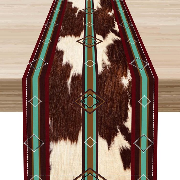 an image of a cowhide rug with geometric designs on it's edges and sides