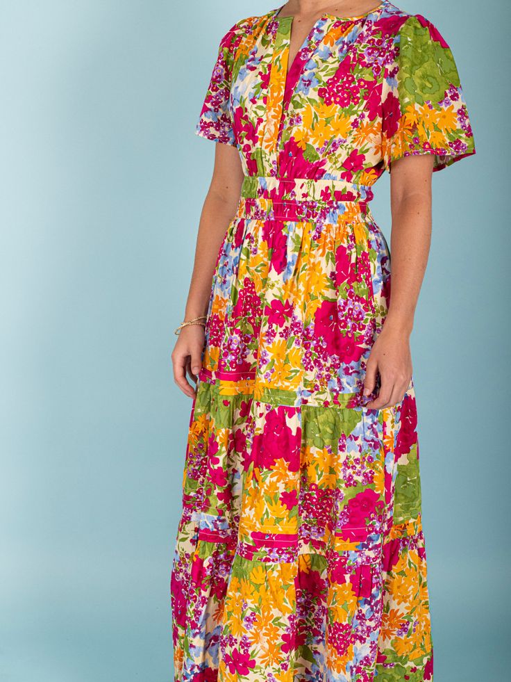 Indulge in the beauty and charm of summer with our Daffodil Garden Maxi Dress. Featuring a vibrant floral print, this dress is the perfect addition to your wardrobe. Made with lightweight material and a flowing design, it offers both style and comfort. Make a statement and brighten up any occasion with this must-have dress! Material: 50% Cotton, 50% Rayon Care: Machine wash cold. Tumble dry. Size. Fits true to size.