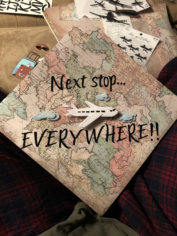 a graduation cap with the words next stop everywhere written on it in black and white