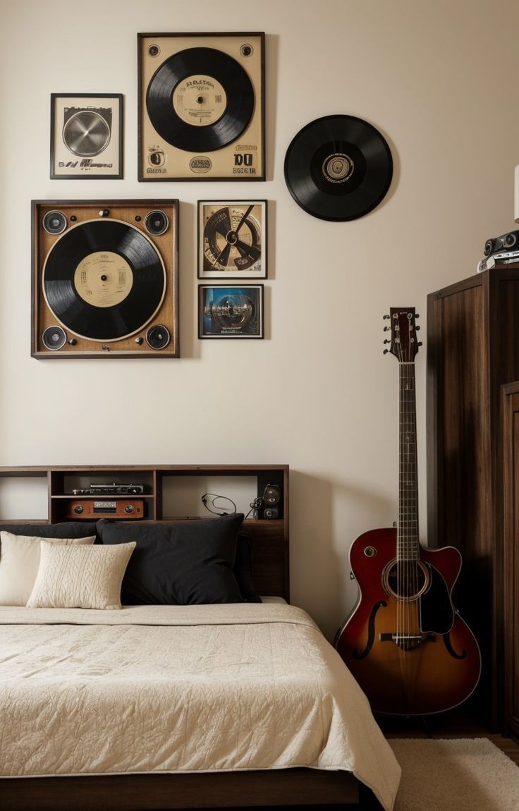 a bed room with a neatly made bed and lots of records on the wall above it