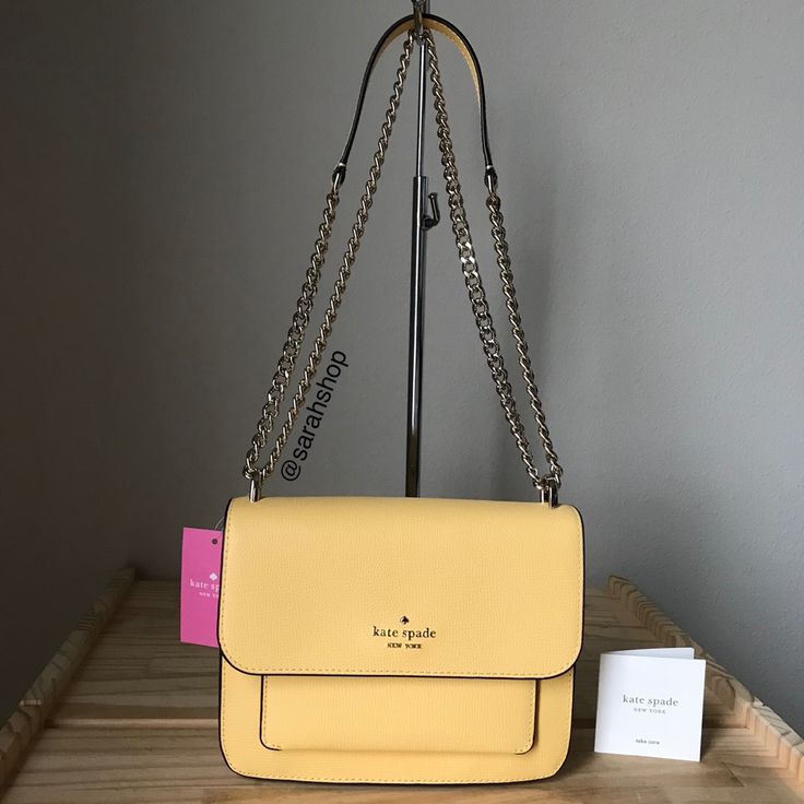 100% Authentic Kate Spade Remi Refined Leather Flap Chain Crossbody Daybreak And Gold Hardware Brand New With Tags 8” (L) X 6.5” (H) X 2.5” (D) Chain Strap Is Not Removable Formal Yellow Shoulder Bag With Chain Strap, Elegant Yellow Shoulder Bag With Chain Strap, Bags Kate Spade, Kate Spade Purse, Small Crossbody Bag, Small Crossbody, Kate Spade Bags, Kate Spade Bag, Chain Strap