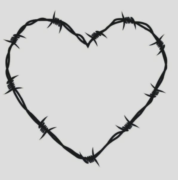 a heart made out of barbed wire